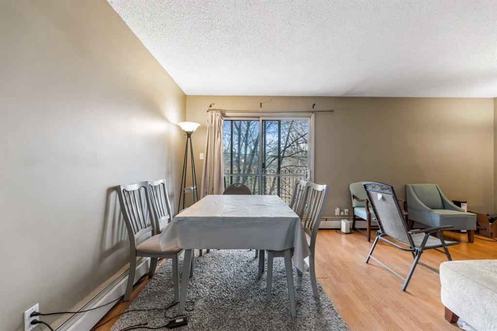 204-4328 4 Street Nw, Calgary, AB - Indoor Photo Showing Dining Room