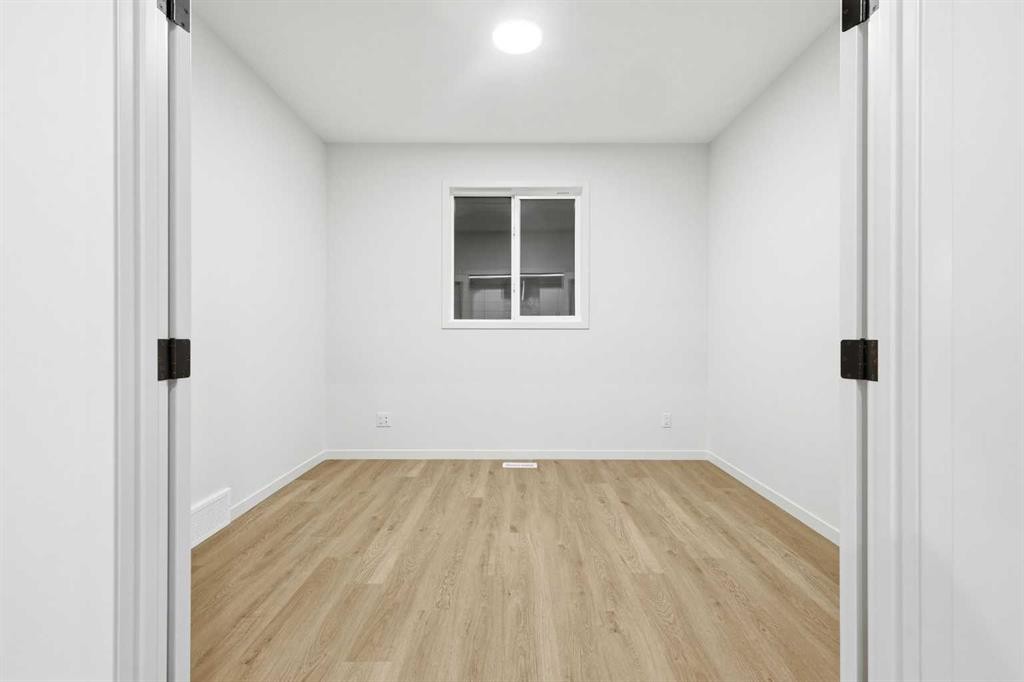 48 Herron Way Ne, Calgary, AB - Indoor Photo Showing Other Room