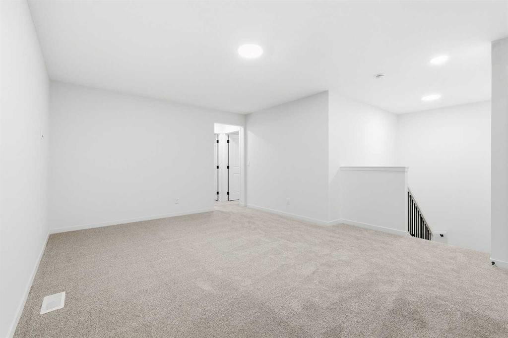 48 Herron Way Ne, Calgary, AB - Indoor Photo Showing Other Room
