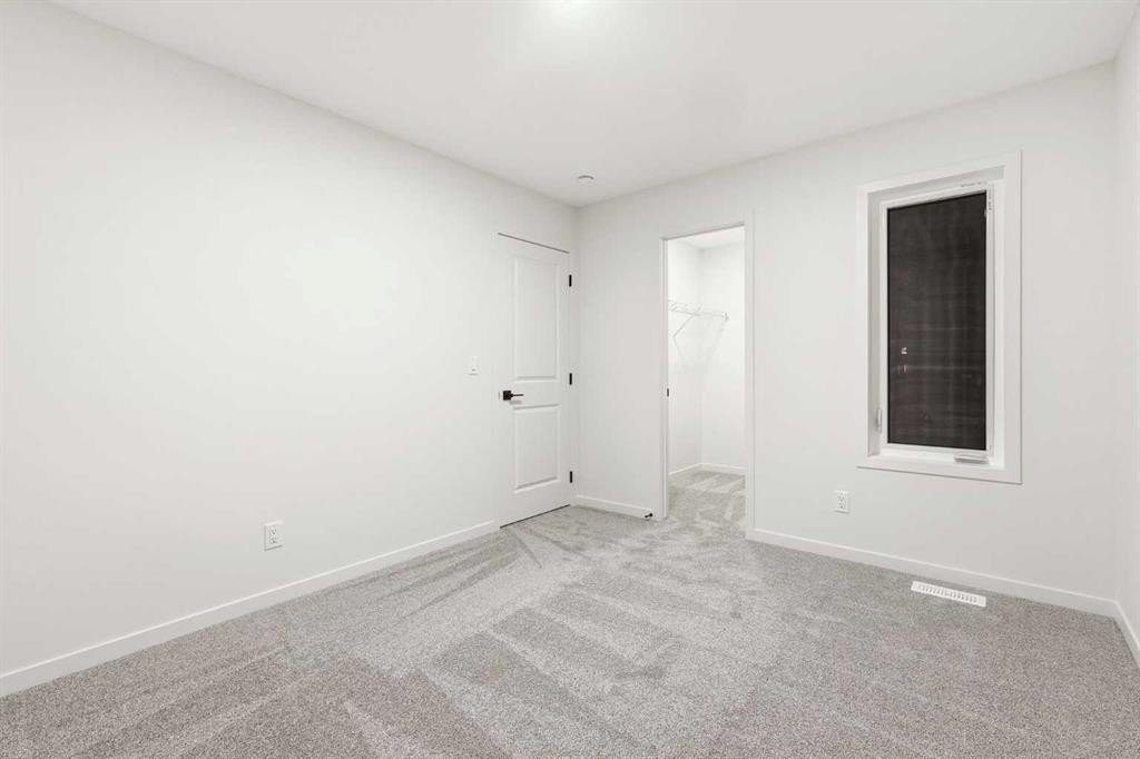 48 Herron Way Ne, Calgary, AB - Indoor Photo Showing Other Room