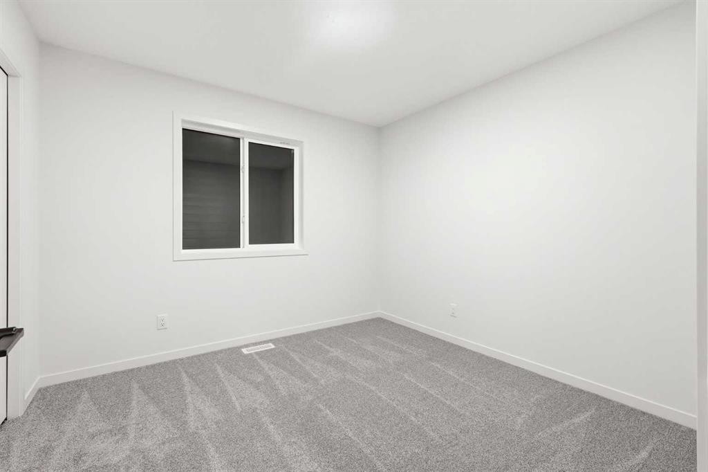 48 Herron Way Ne, Calgary, AB - Indoor Photo Showing Other Room