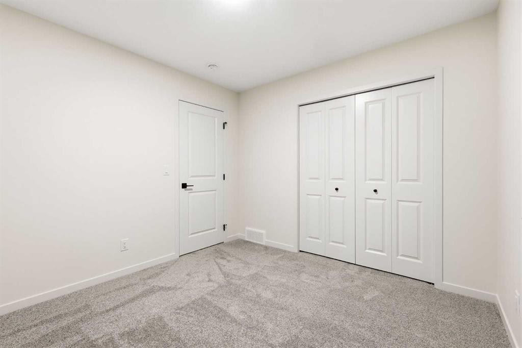 48 Herron Way Ne, Calgary, AB - Indoor Photo Showing Other Room