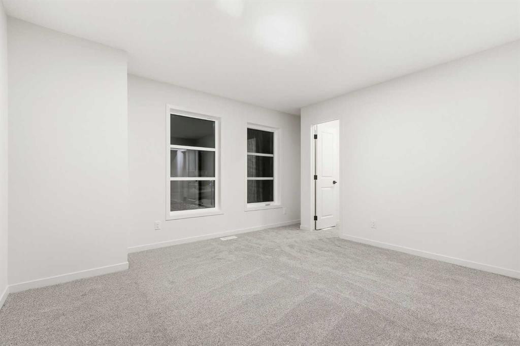 48 Herron Way Ne, Calgary, AB - Indoor Photo Showing Other Room