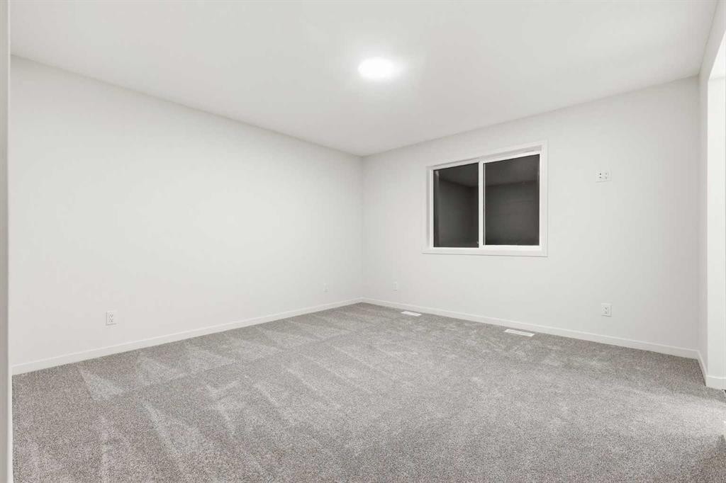 48 Herron Way Ne, Calgary, AB - Indoor Photo Showing Other Room