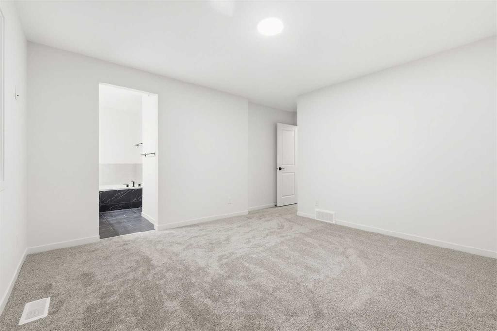 48 Herron Way Ne, Calgary, AB - Indoor Photo Showing Other Room