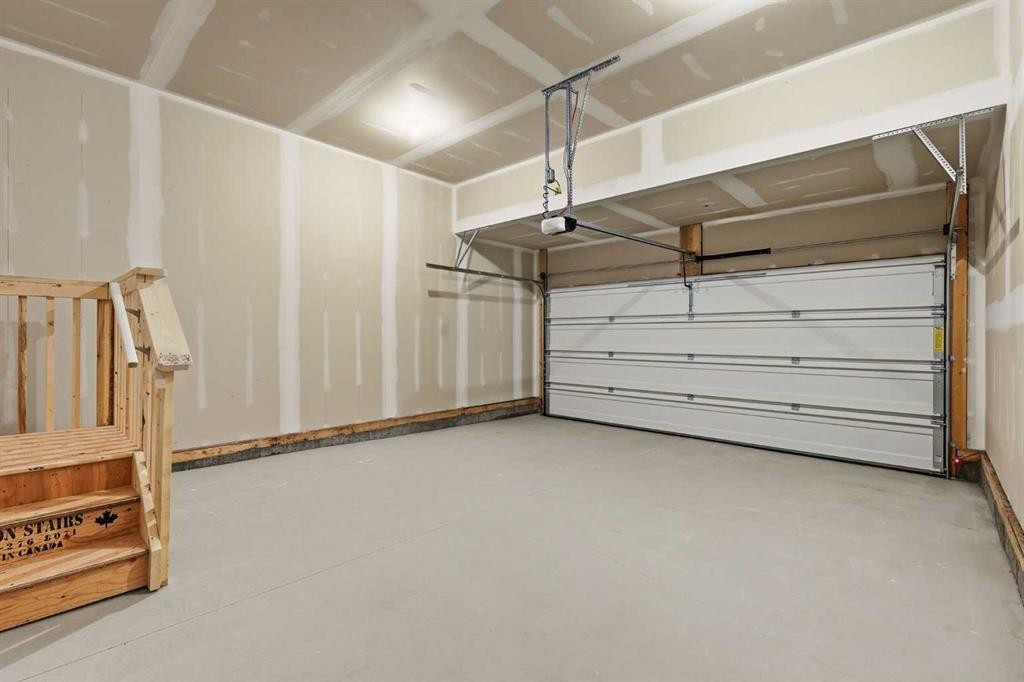 48 Herron Way Ne, Calgary, AB - Indoor Photo Showing Garage