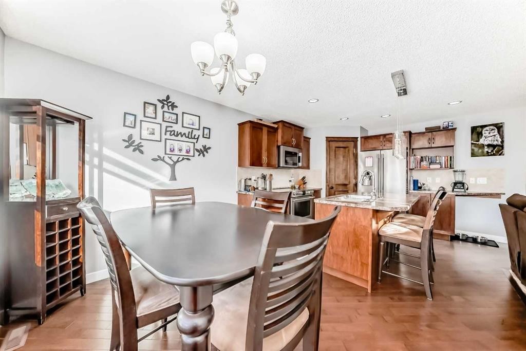 562 New Brighton Drive Se, Calgary, AB - Indoor Photo Showing Dining Room