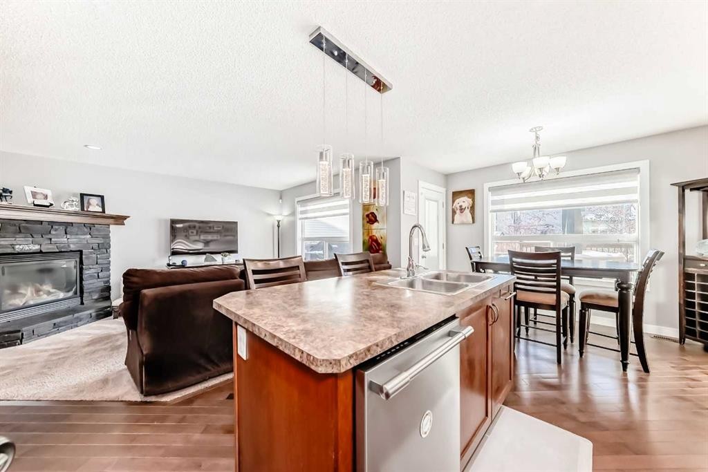 562 New Brighton Drive Se, Calgary, AB - Indoor With Fireplace
