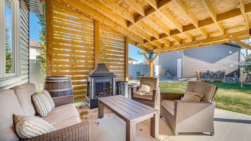 148 Covepark Close Ne, Calgary, AB - With Fireplace With Deck Patio Veranda With Exterior
