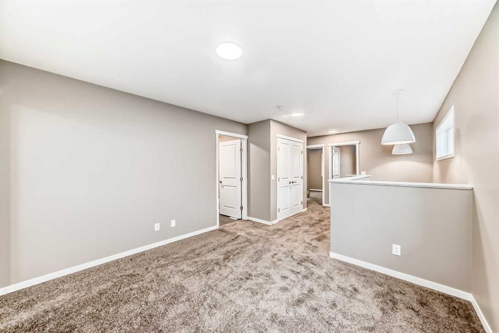 131 Sawgrass Gate Nw, Airdrie, AB - Indoor Photo Showing Other Room