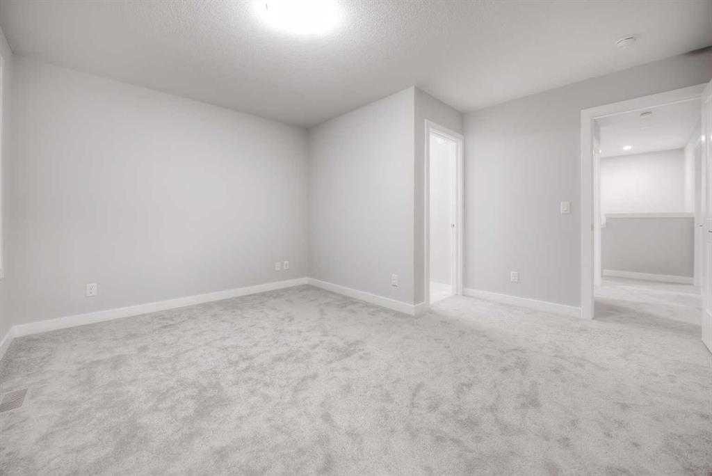 917 Crestridge Common Sw, Calgary, AB - Indoor Photo Showing Other Room