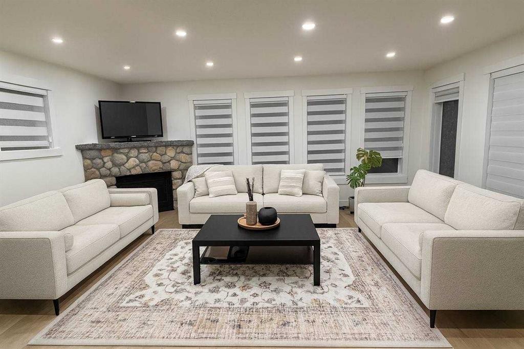 447 Tuscany Ridge Heights Nw, Calgary, AB - Indoor Photo Showing Living Room With Fireplace