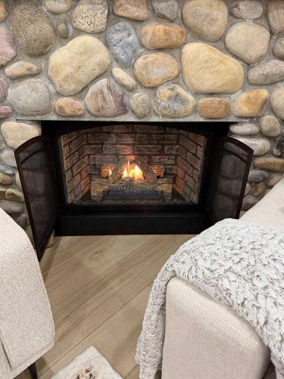 447 Tuscany Ridge Heights Nw, Calgary, AB - Indoor Photo Showing Living Room With Fireplace