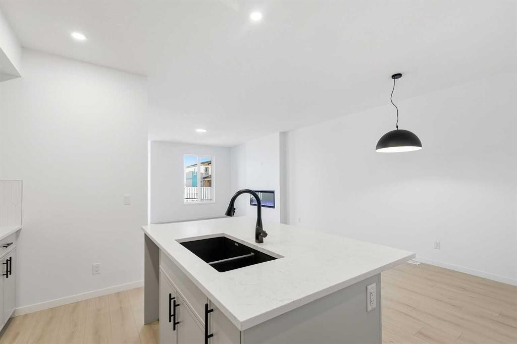 355 Herron Landing Ne, Calgary, AB - Indoor Photo Showing Kitchen With Double Sink