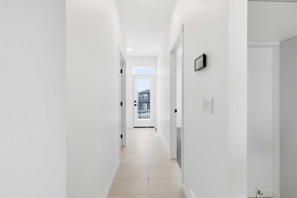 355 Herron Landing Ne, Calgary, AB - Indoor Photo Showing Other Room