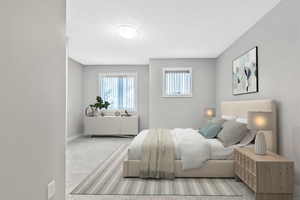 1305-2445 Kingsland Road Se, Airdrie, AB - Indoor Photo Showing Bedroom