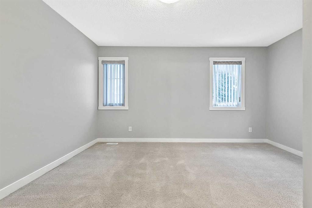 1305-2445 Kingsland Road Se, Airdrie, AB - Indoor Photo Showing Other Room