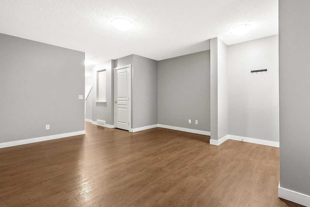 1305-2445 Kingsland Road Se, Airdrie, AB - Indoor Photo Showing Other Room
