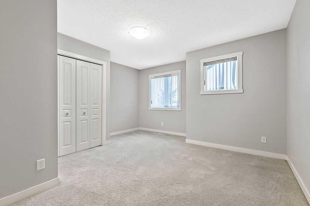 1305-2445 Kingsland Road Se, Airdrie, AB - Indoor Photo Showing Other Room