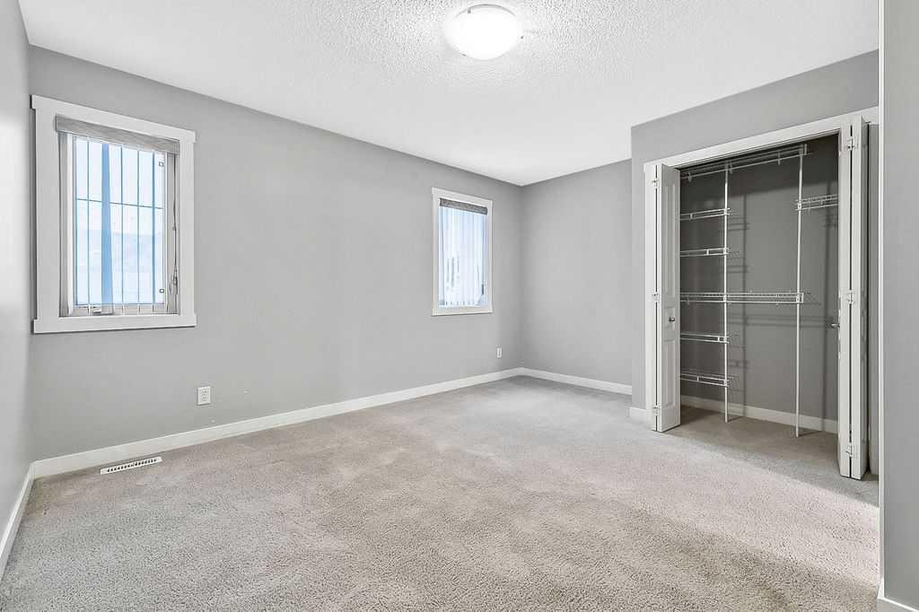 1305-2445 Kingsland Road Se, Airdrie, AB - Indoor Photo Showing Other Room