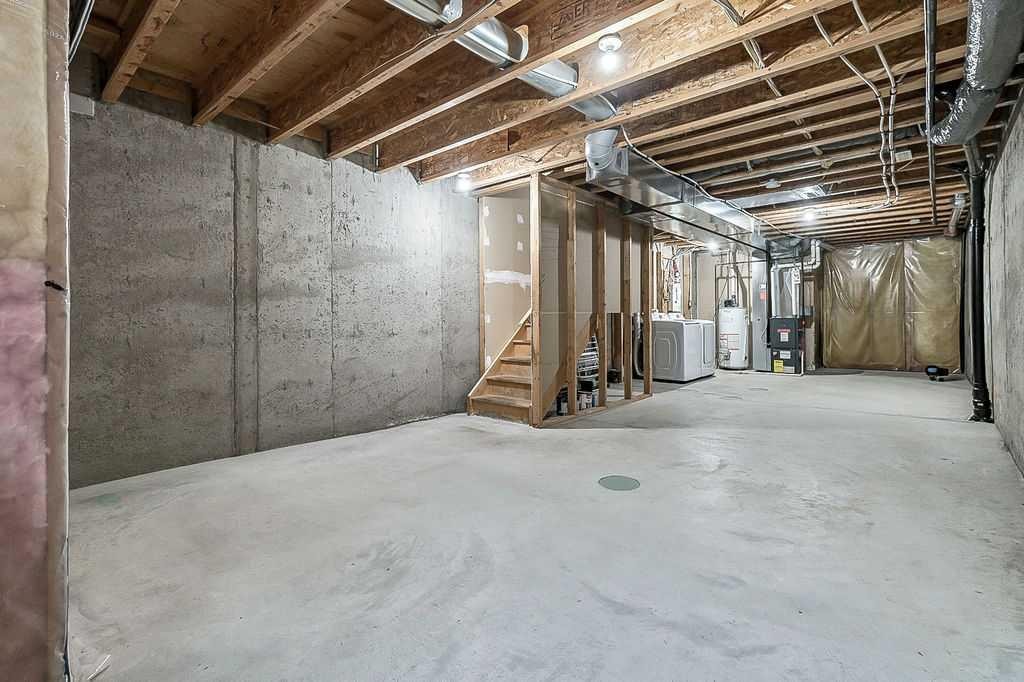 1305-2445 Kingsland Road Se, Airdrie, AB - Indoor Photo Showing Basement