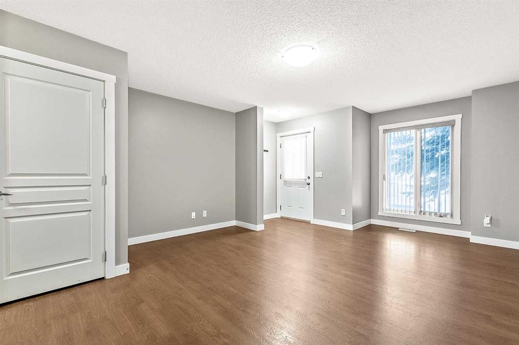1305-2445 Kingsland Road Se, Airdrie, AB - Indoor Photo Showing Other Room