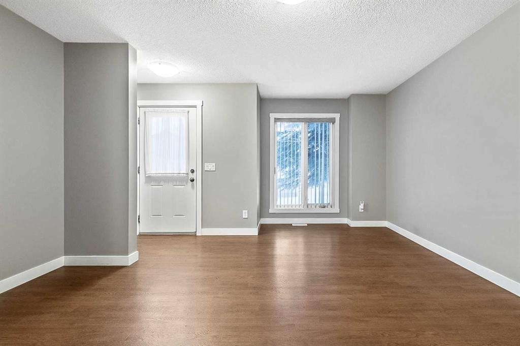 1305-2445 Kingsland Road Se, Airdrie, AB - Indoor Photo Showing Other Room