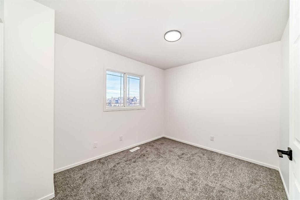99 Saddlecrest Way Ne, Calgary, AB - Indoor Photo Showing Other Room