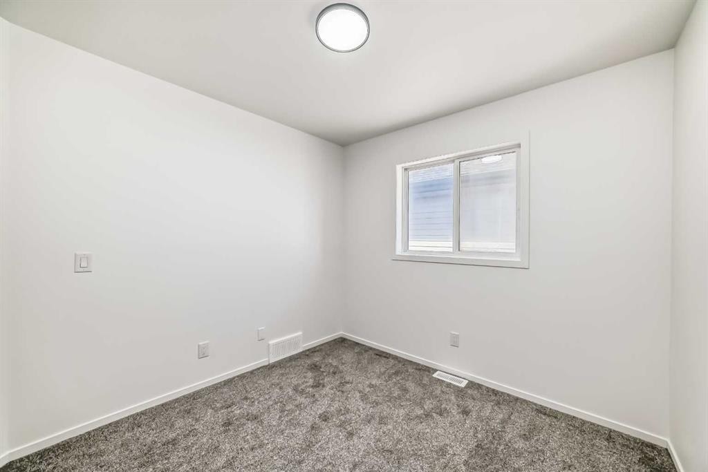 99 Saddlecrest Way Ne, Calgary, AB - Indoor Photo Showing Other Room