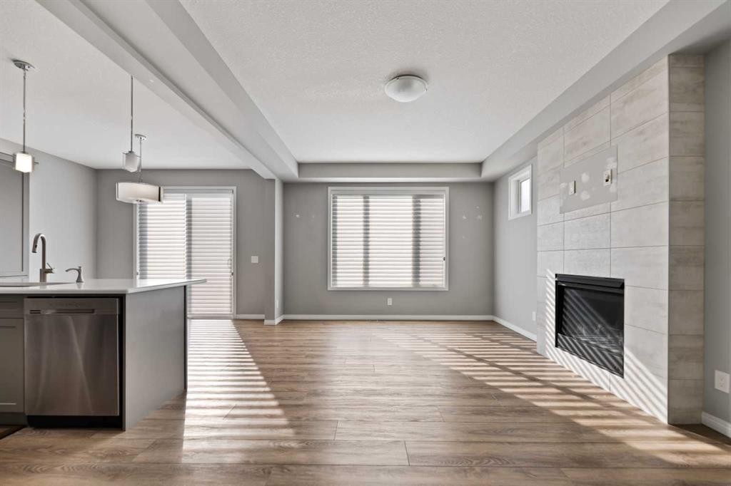 138 Cityside Way Ne, Calgary, AB - Indoor With Fireplace