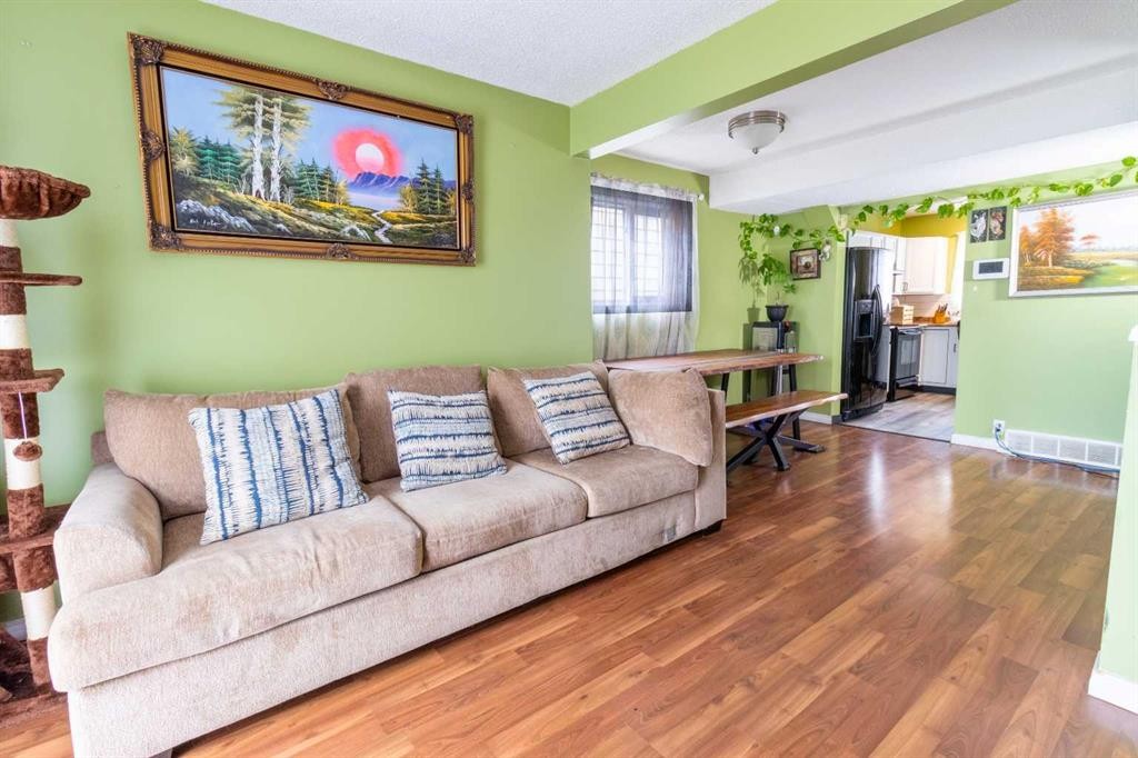165 Whitewood Place Ne, Calgary, AB - Indoor Photo Showing Living Room