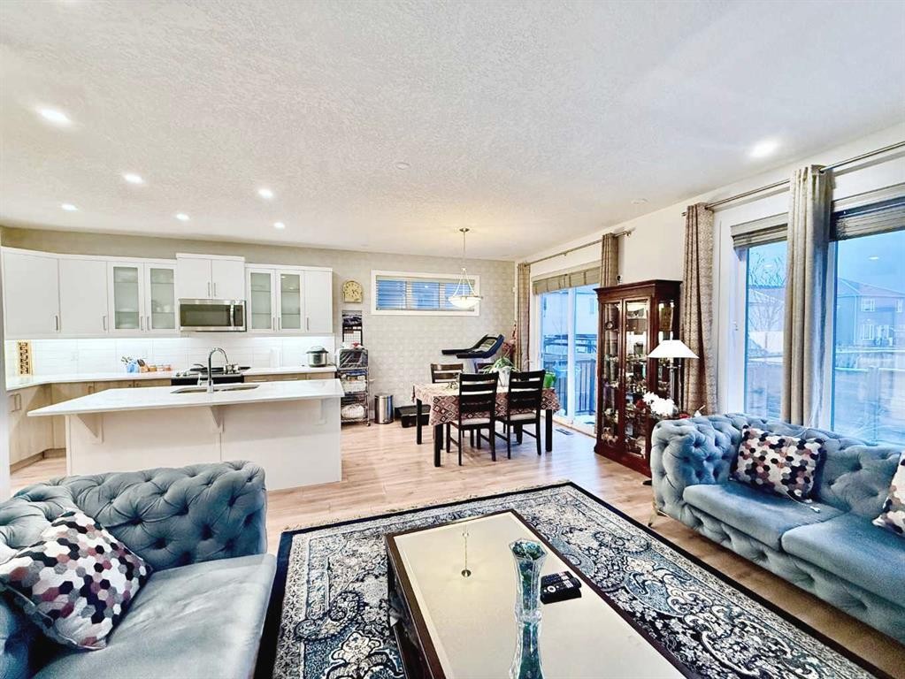 148 Carrington Circle Nw, Calgary, AB - Indoor Photo Showing Living Room