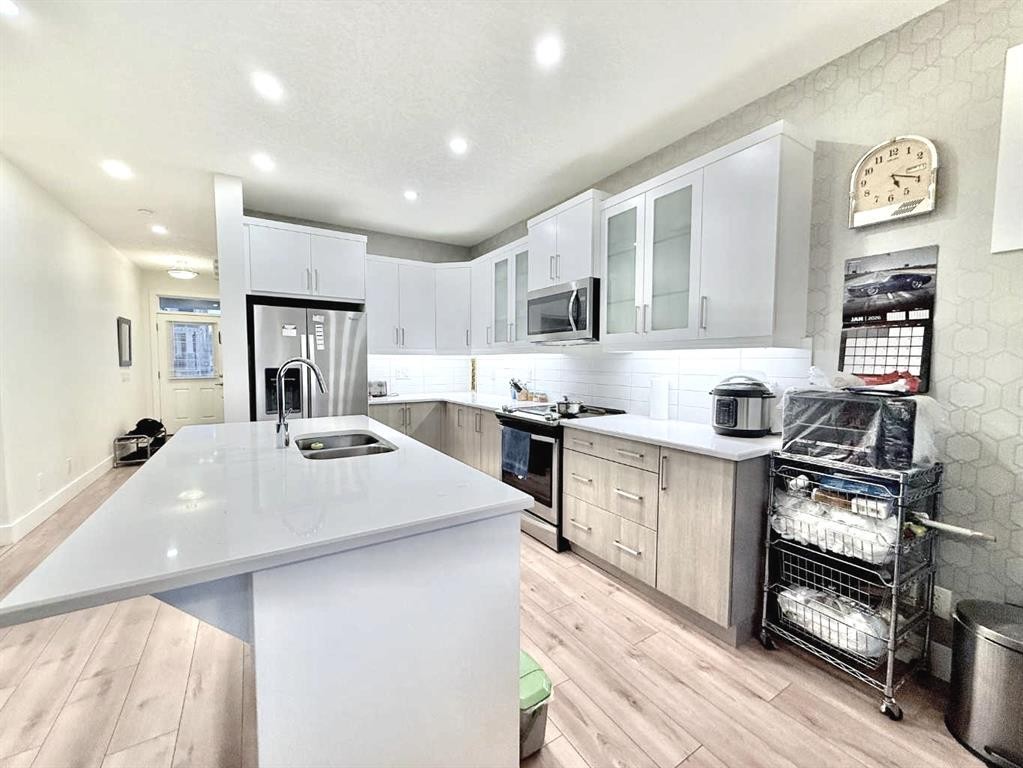 148 Carrington Circle Nw, Calgary, AB - Indoor Photo Showing Kitchen With Stainless Steel Kitchen With Double Sink With Upgraded Kitchen