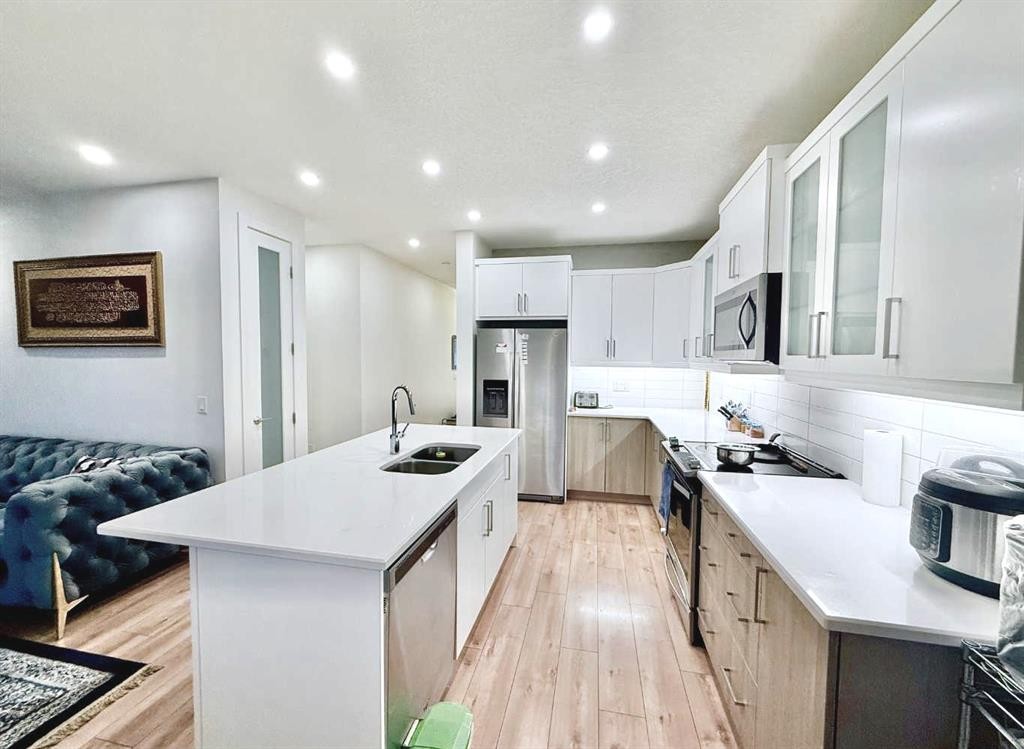 148 Carrington Circle Nw, Calgary, AB - Indoor Photo Showing Kitchen With Stainless Steel Kitchen With Double Sink With Upgraded Kitchen