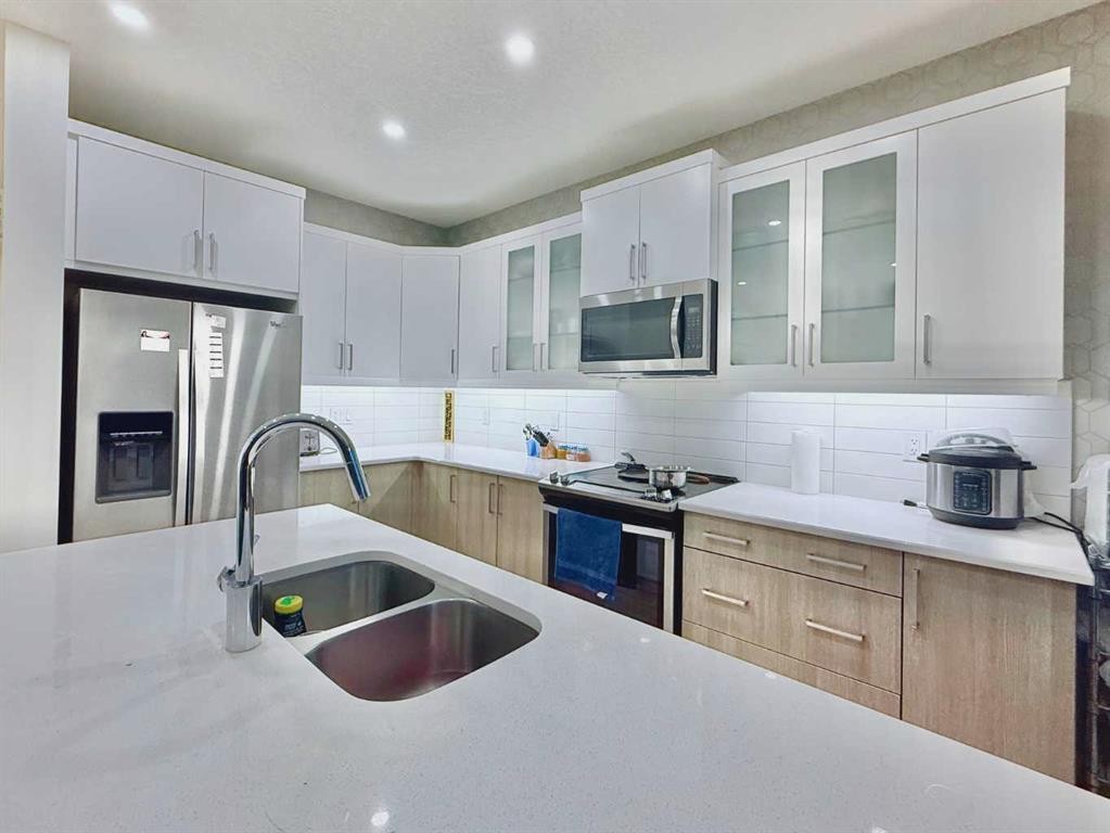 148 Carrington Circle Nw, Calgary, AB - Indoor Photo Showing Kitchen With Stainless Steel Kitchen With Double Sink With Upgraded Kitchen