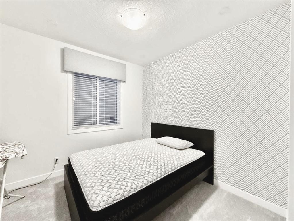 148 Carrington Circle Nw, Calgary, AB - Indoor Photo Showing Bedroom