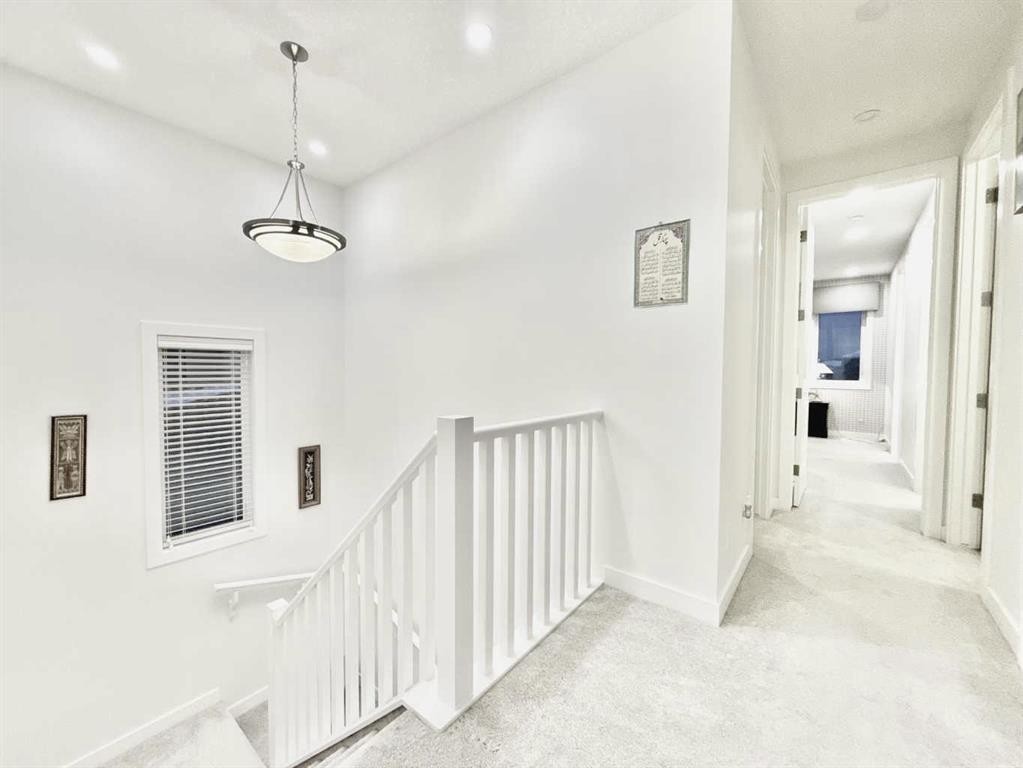 148 Carrington Circle Nw, Calgary, AB - Indoor Photo Showing Other Room