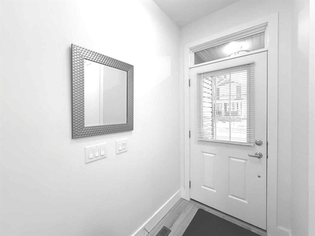148 Carrington Circle Nw, Calgary, AB - Indoor Photo Showing Other Room