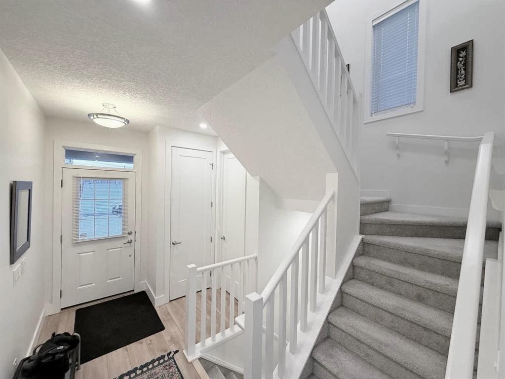 148 Carrington Circle Nw, Calgary, AB - Indoor Photo Showing Other Room