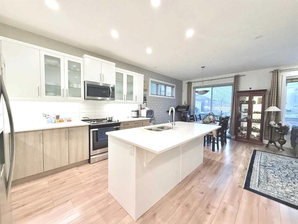 148 Carrington Circle Nw, Calgary, AB - Indoor Photo Showing Kitchen With Double Sink With Upgraded Kitchen