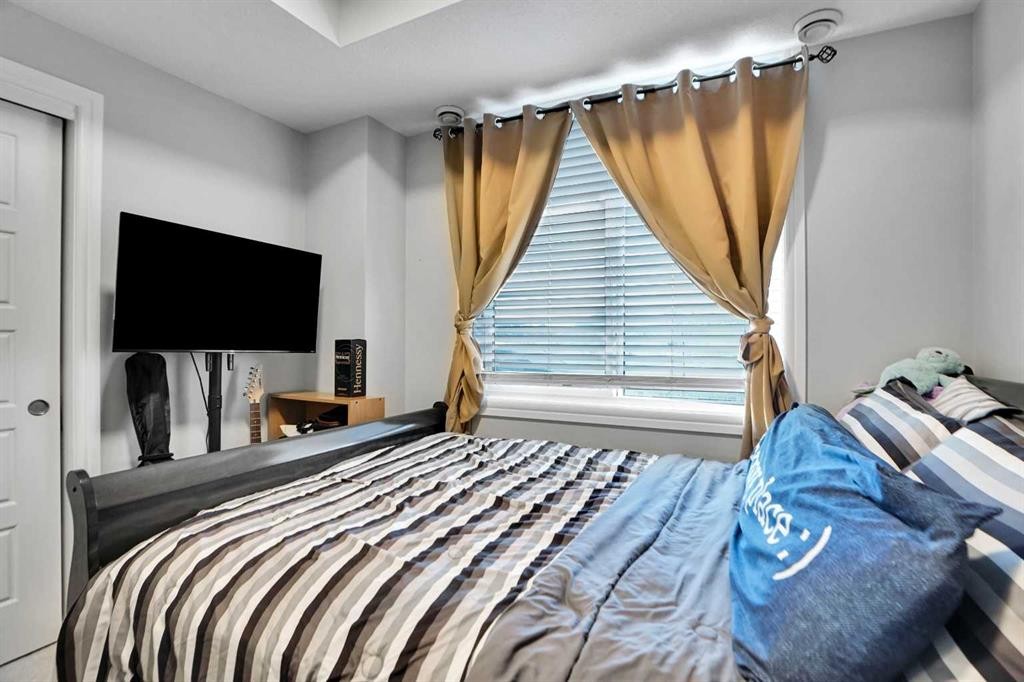 28 Savanna Passage Ne, Calgary, AB - Indoor Photo Showing Bedroom