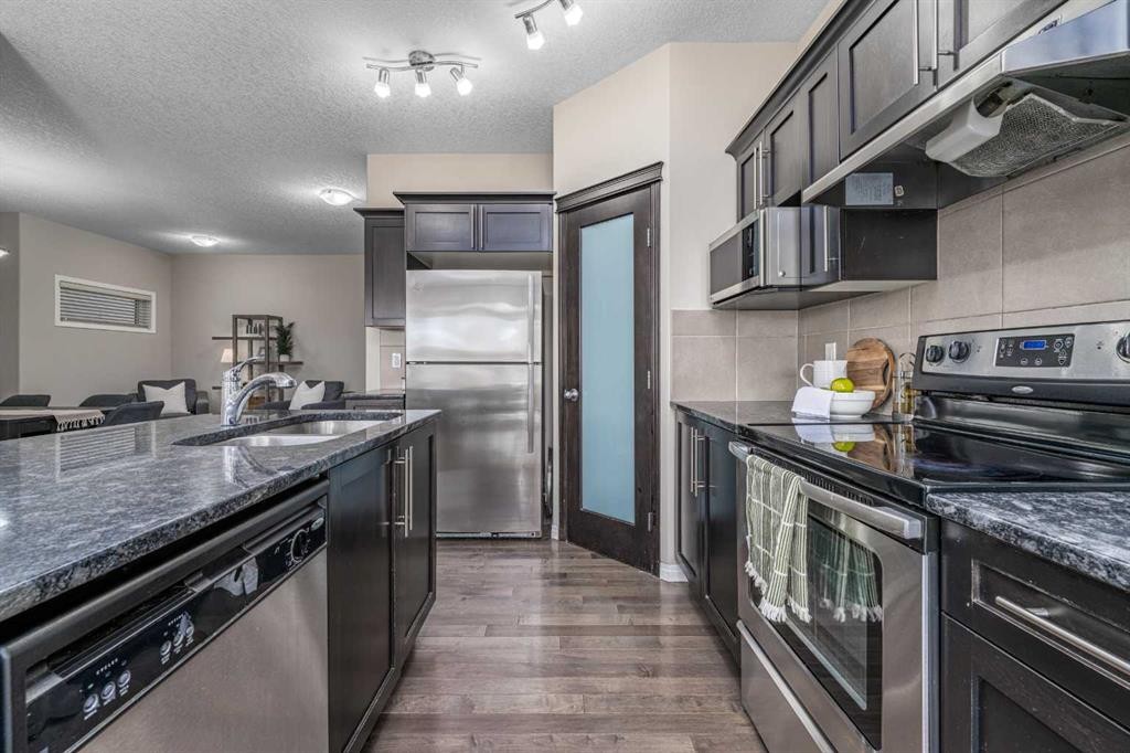 194 Kincora Glen Rise Nw, Calgary, AB - Indoor Photo Showing Kitchen With Double Sink With Upgraded Kitchen