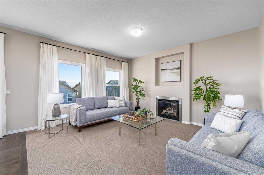 194 Kincora Glen Rise Nw, Calgary, AB - Indoor Photo Showing Living Room With Fireplace