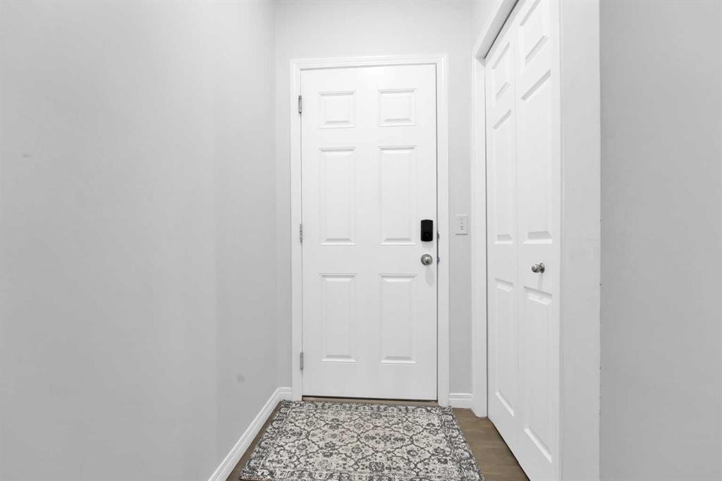 2101 Luxstone Boulevard Sw, Airdrie, AB - Indoor Photo Showing Other Room