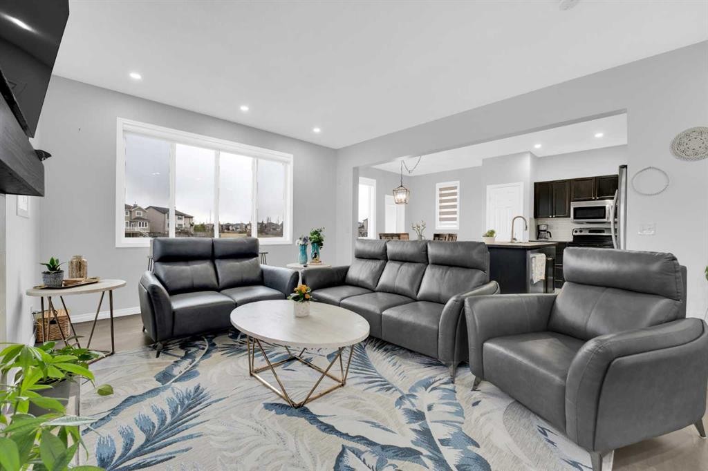 2101 Luxstone Boulevard Sw, Airdrie, AB - Indoor Photo Showing Living Room
