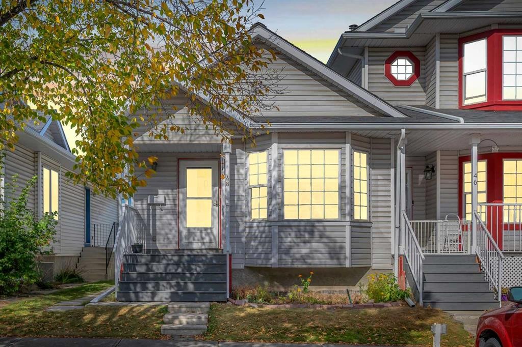 48 Martin Crossing Court Ne, Calgary, AB - Outdoor With Deck Patio Veranda With Facade