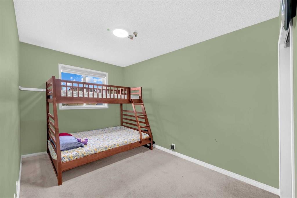 48 Martin Crossing Court Ne, Calgary, AB - Indoor Photo Showing Bedroom