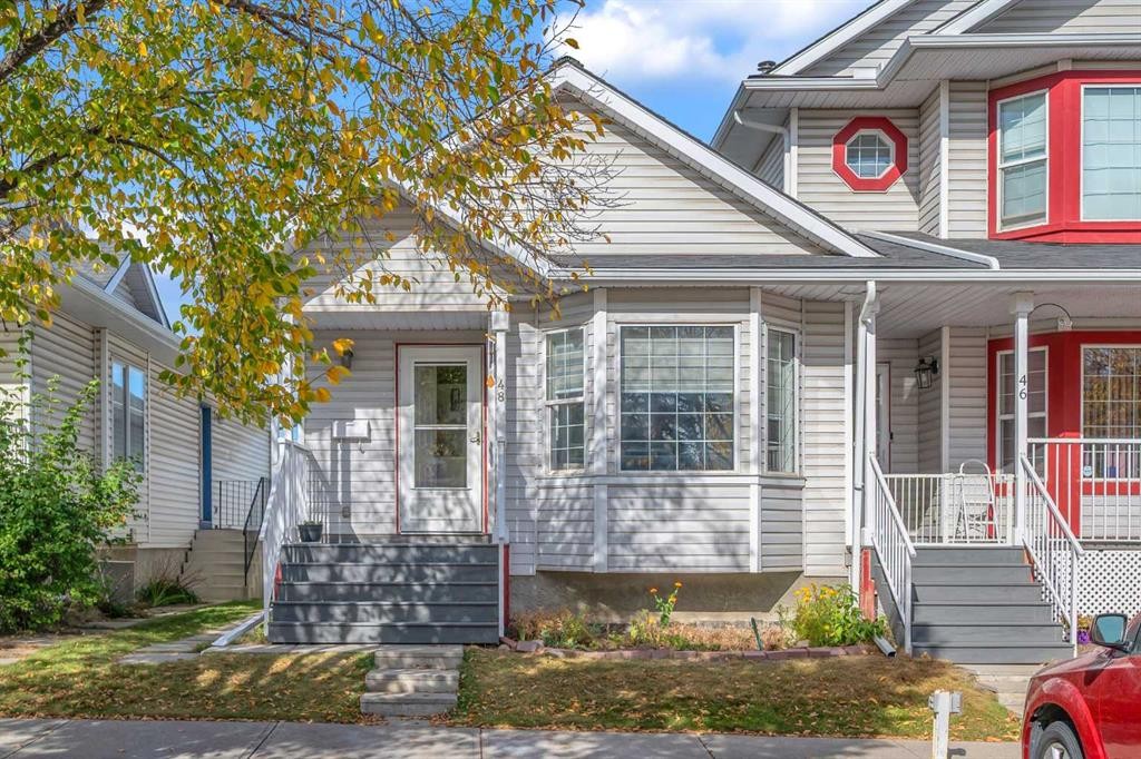 48 Martin Crossing Court Ne, Calgary, AB - Outdoor With Deck Patio Veranda With Facade