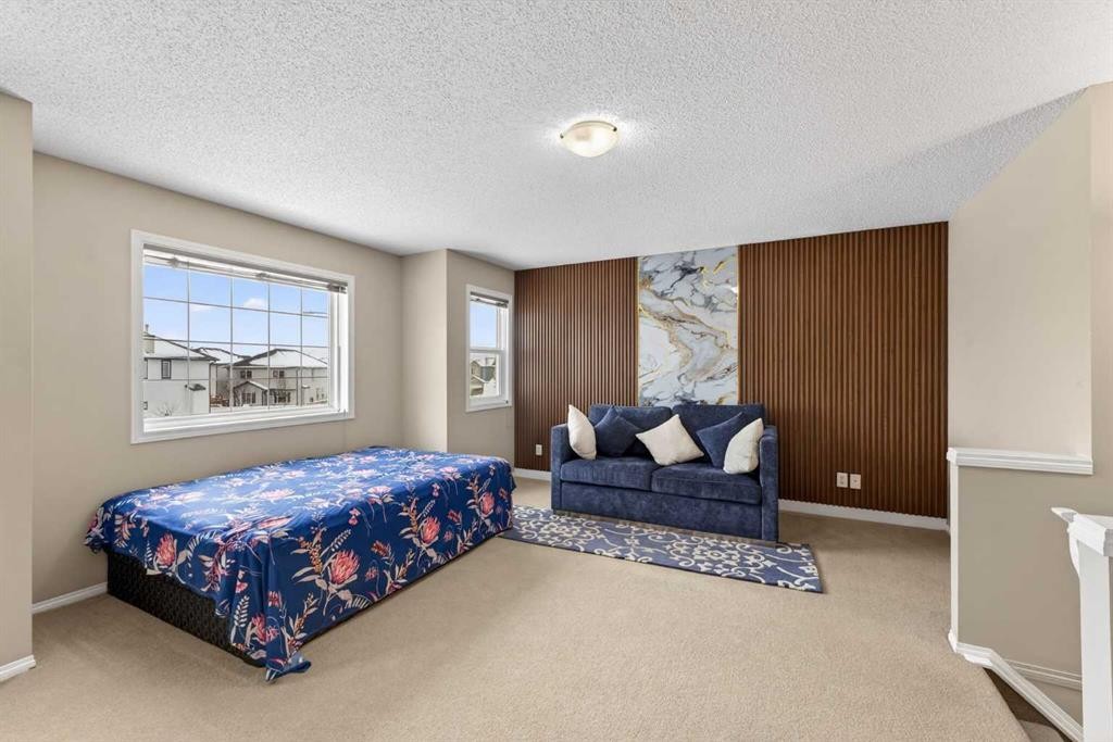 106 Saddlecrest Crescent Ne, Calgary, AB - Indoor Photo Showing Bedroom