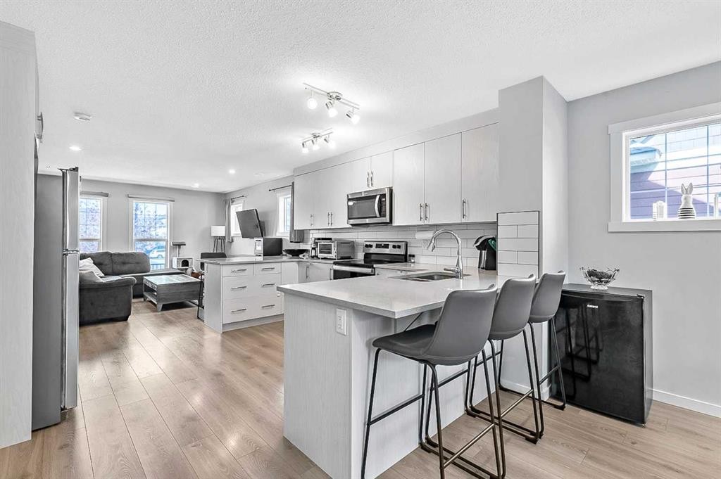 130 Cranbrook Square Se, Calgary, AB - Indoor Photo Showing Kitchen With Upgraded Kitchen